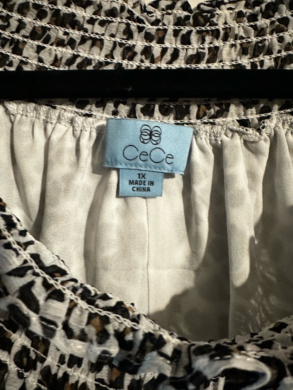 CeCe Cream and Brown Leopard Smocked Neck Ruffle Sleeve Blouse - Picture 2 of 3